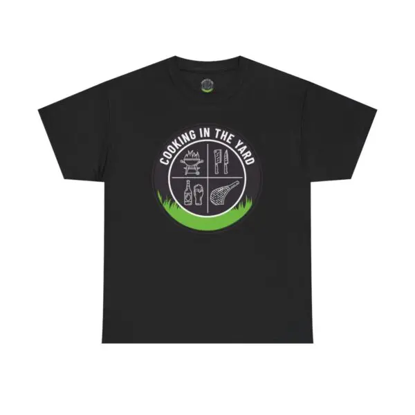 The Cooking In The Yard T-Shirt is a black tee with "Cooking in the Yard" printed in white. It showcases a design featuring icons of a grill, knife, spatula, drink, and meat, encircled by a border with green grass at the base—ideal for anyone who relishes mouthwatering outdoor barbecues.