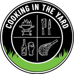 A circular emblem with Cooking in the Yard written on top. The emblem is divided into four quadrants with icons: a grill, kitchen knives, a bottle and glass, and a meat cut. Green grass lines the bottom edge.
