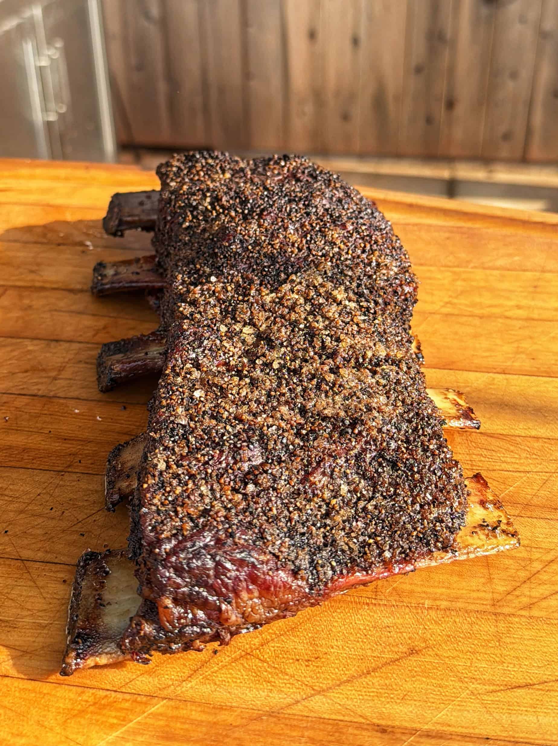 GORILLA GRIP BPA-Free Reversible Kitchen Cutting Board Set of 3, US Designed, Nonporous, Juice Grooves Catch Liquid, Slip Resistant Border, Dishwasher Safe, Durable Large Food Chopping Boards, Black on Amazon A rack of smoked beef ribs with a dark, peppery bark rests on a wooden <a href=