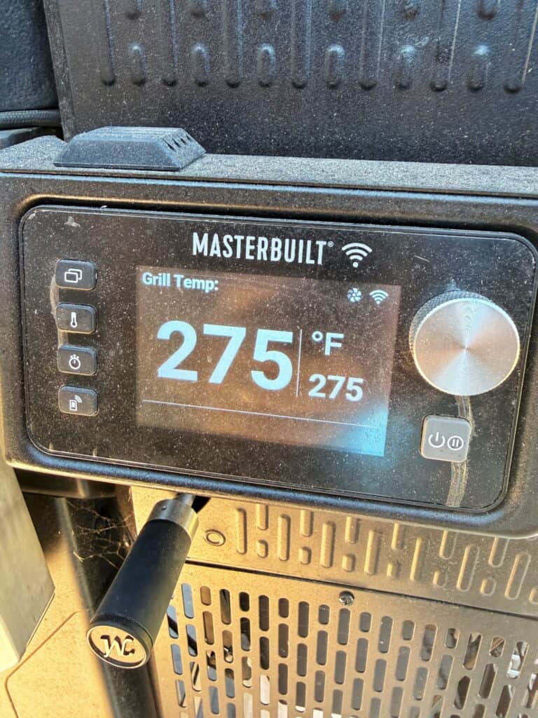 Smoker control display set to 275°F.