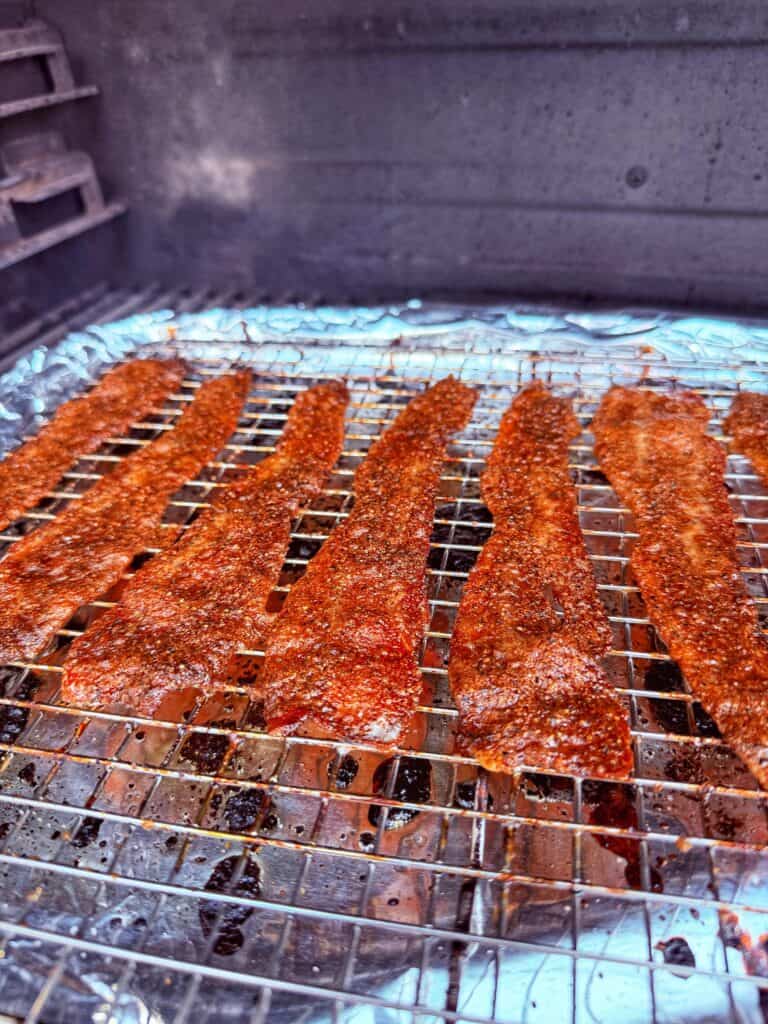Nashville hot candied bacon during preparation.