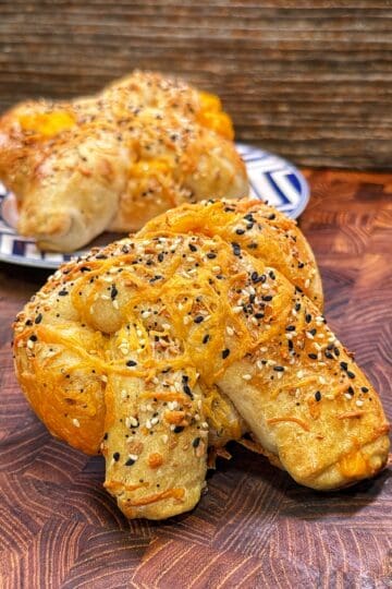 Cheddar cheese stuffed pretzels being prepared.