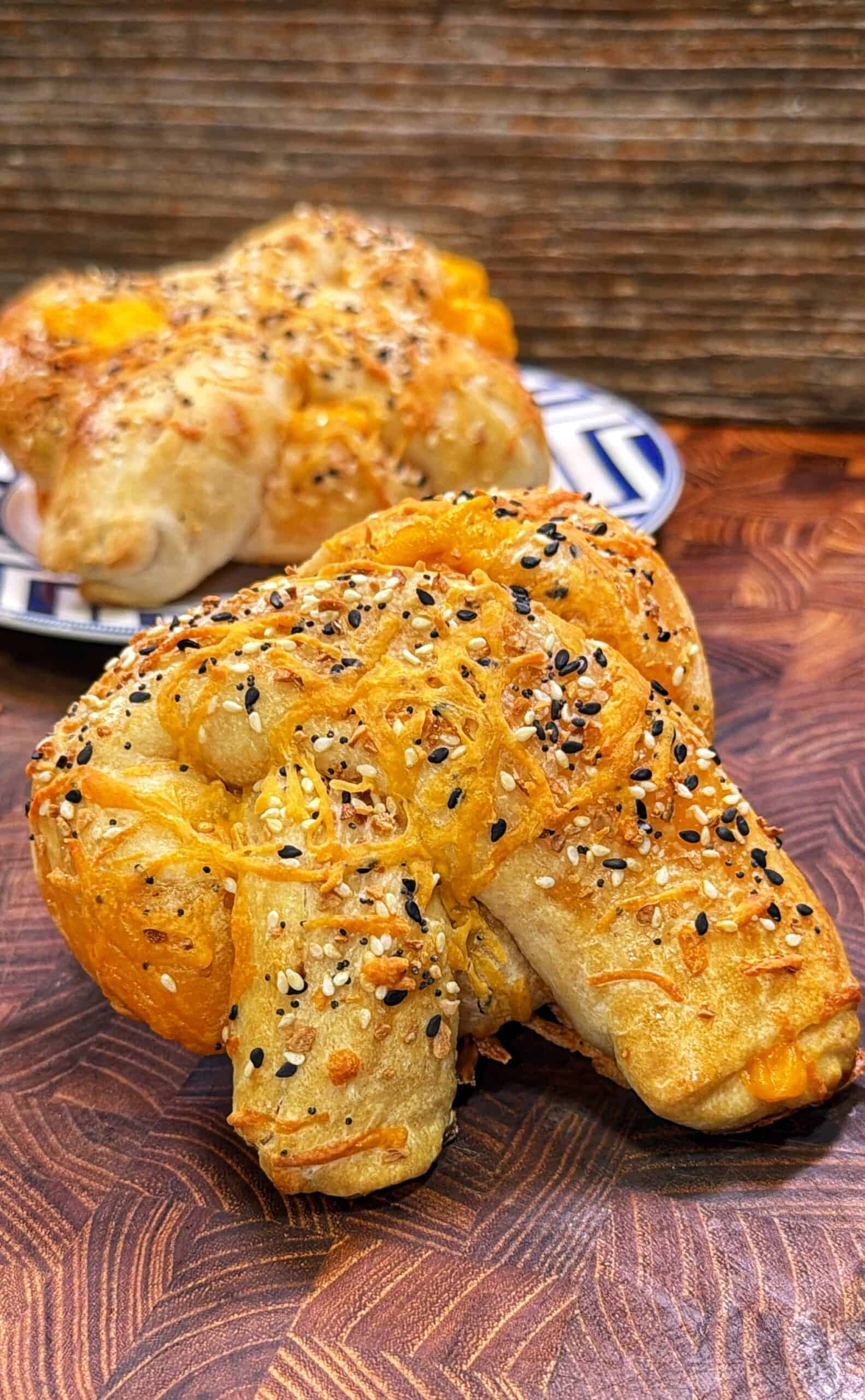 Cheddar cheese stuffed pretzels being prepared.