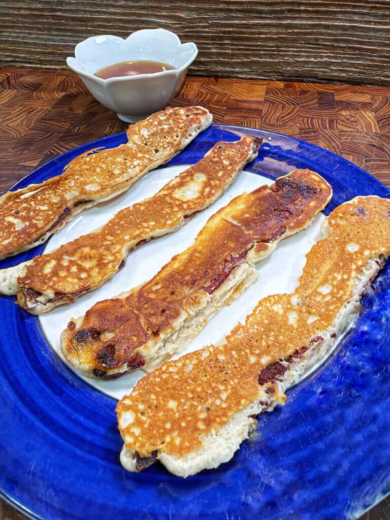 Maple bacon pancakes being prepared.